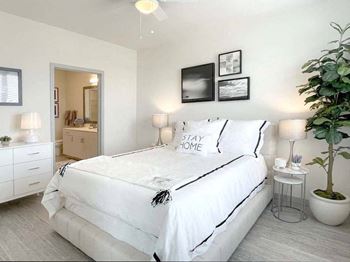 bedroom with cozy bed at Elevate Apartments, Madison, 53718